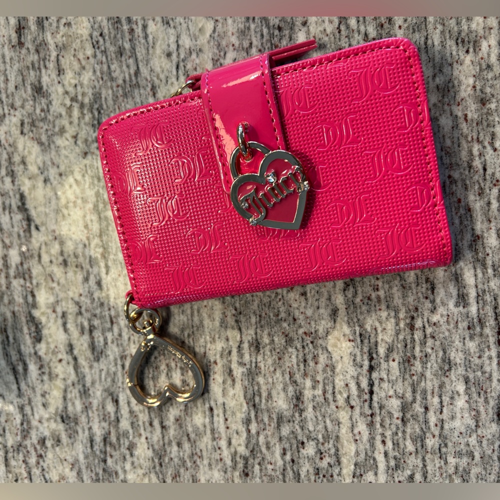 Juicy Couture like new pink wallet with key chain, card slots, and zipper pouch.